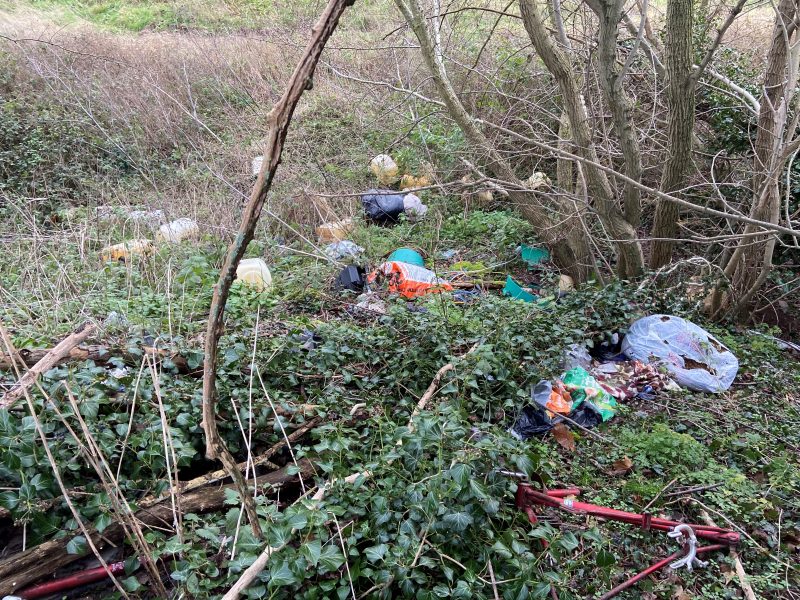 Image of mixed waste disposed of in the countryside near Credenhill